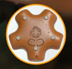 Underside of the night light showing the soft control buttons